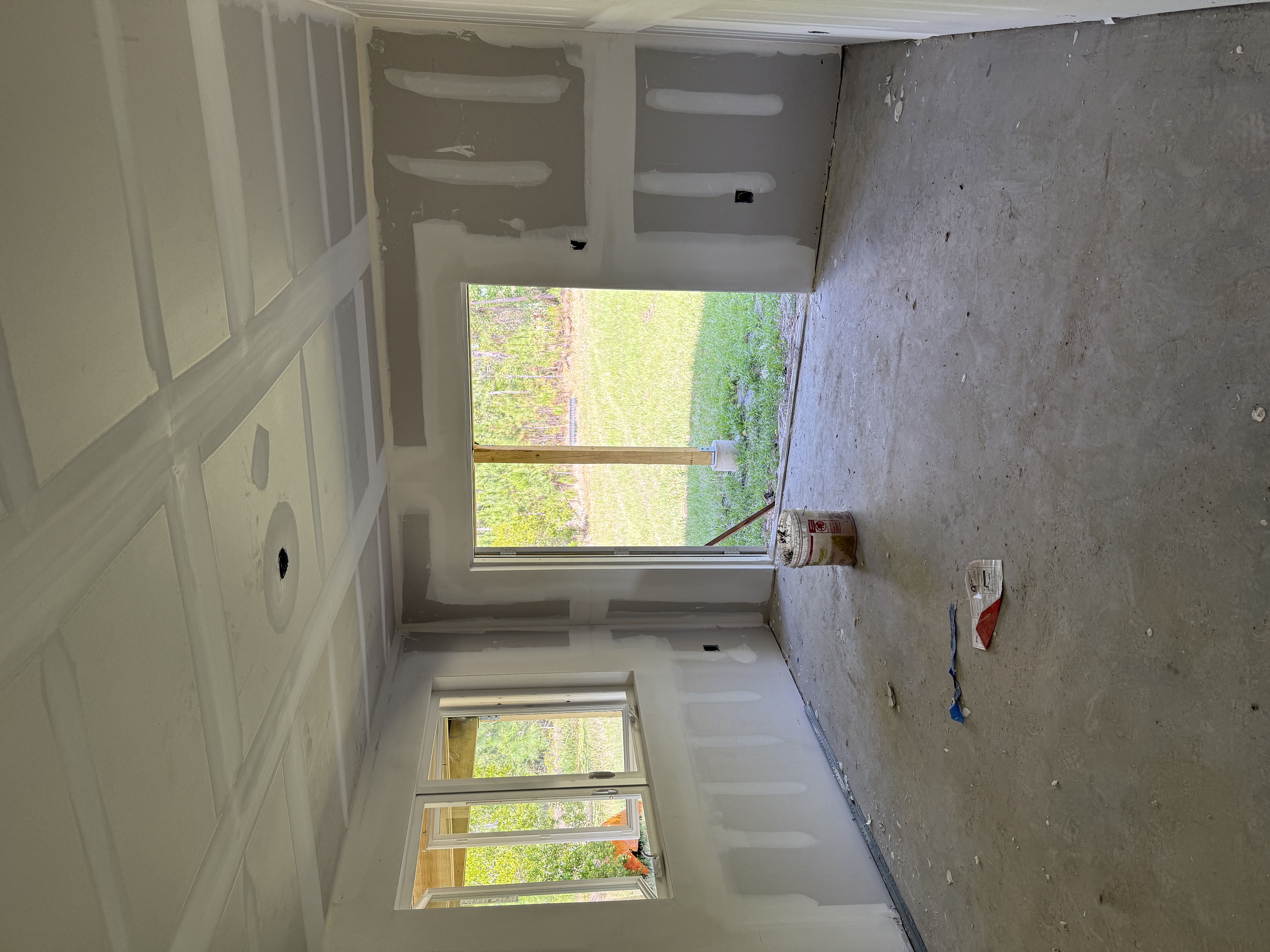 Drywall hung on interior walls of custom home