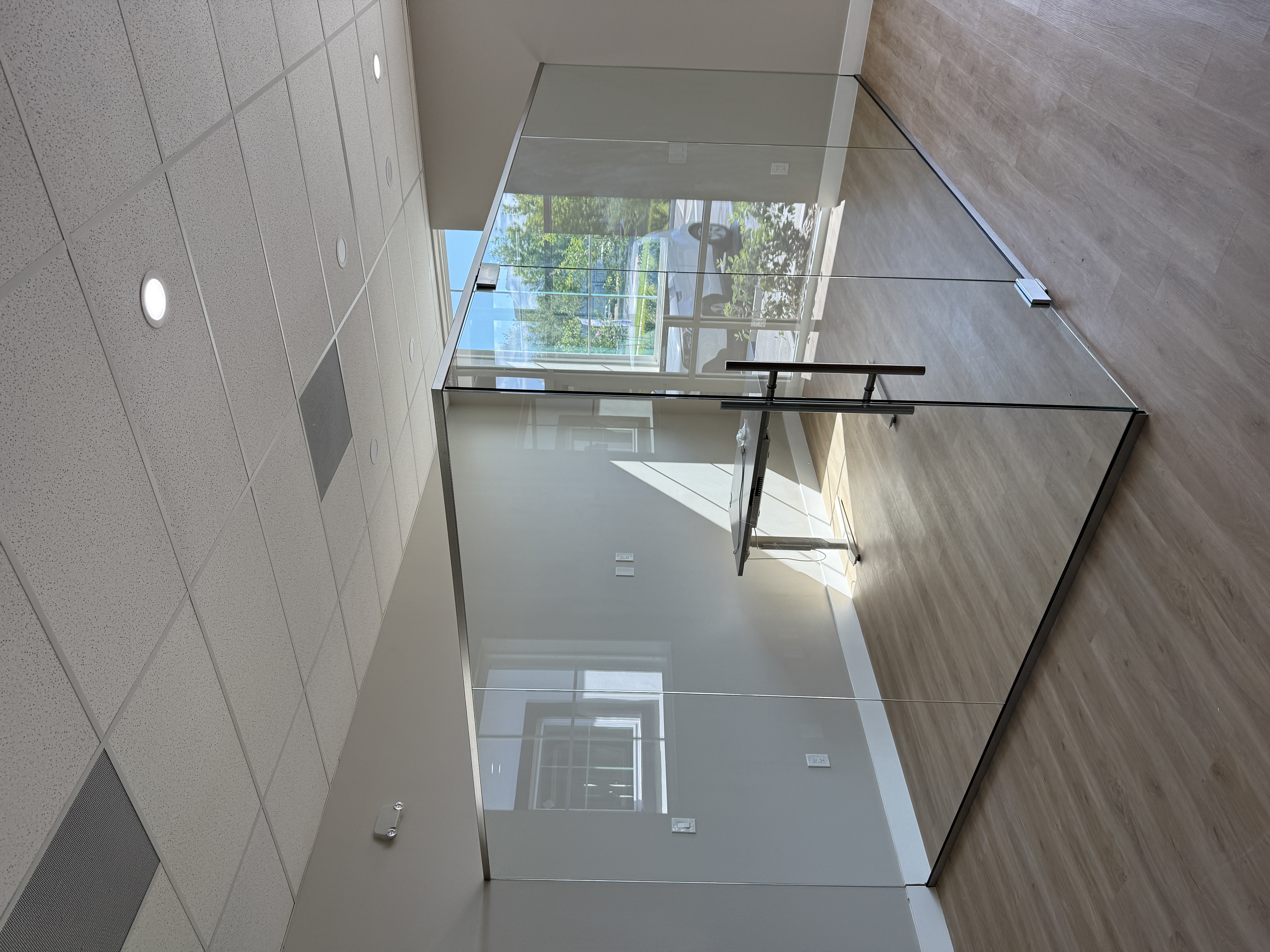 Double-height glass feature wall in luxury custom home