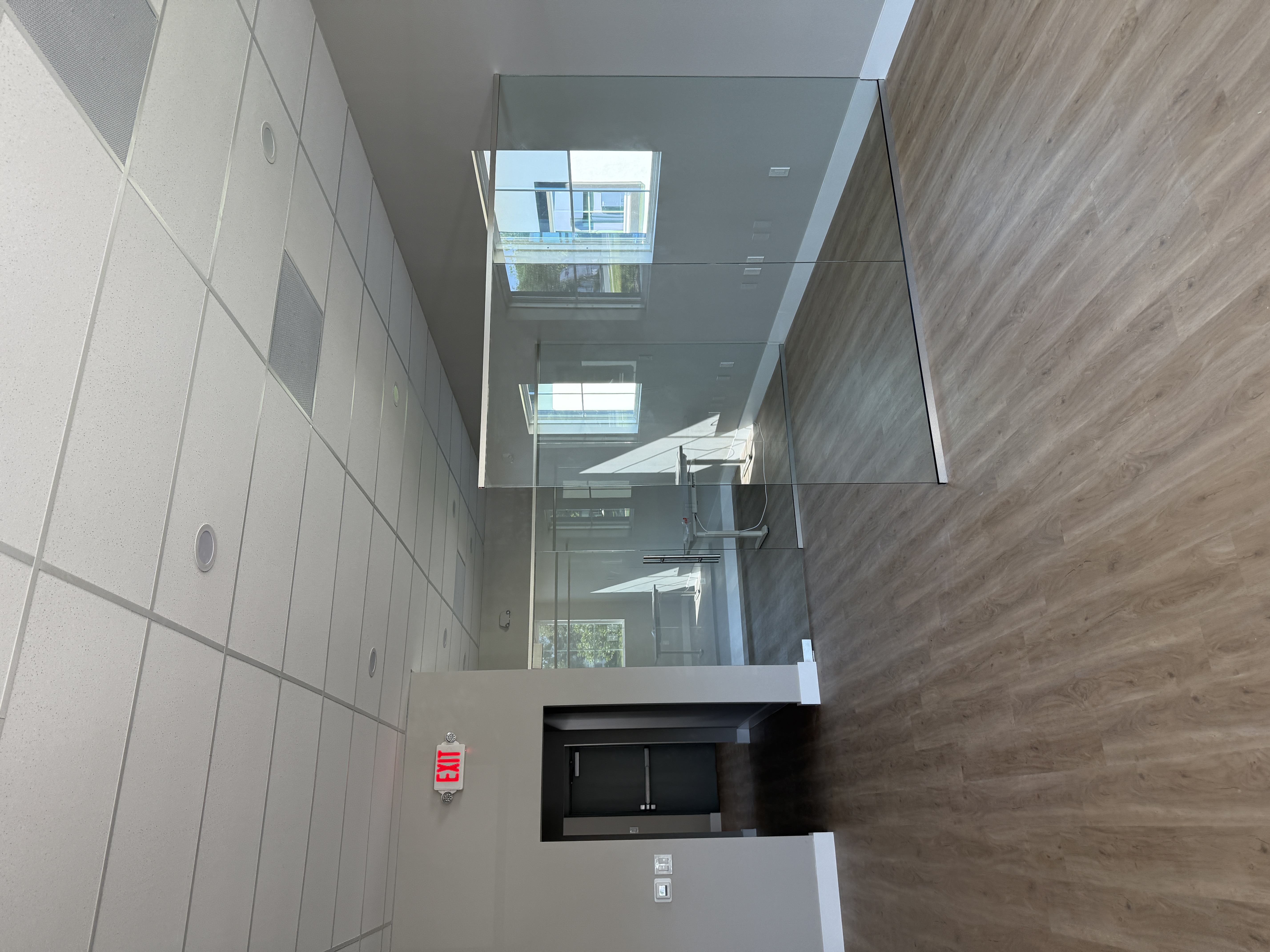 Glass railing detail on staircase in custom home