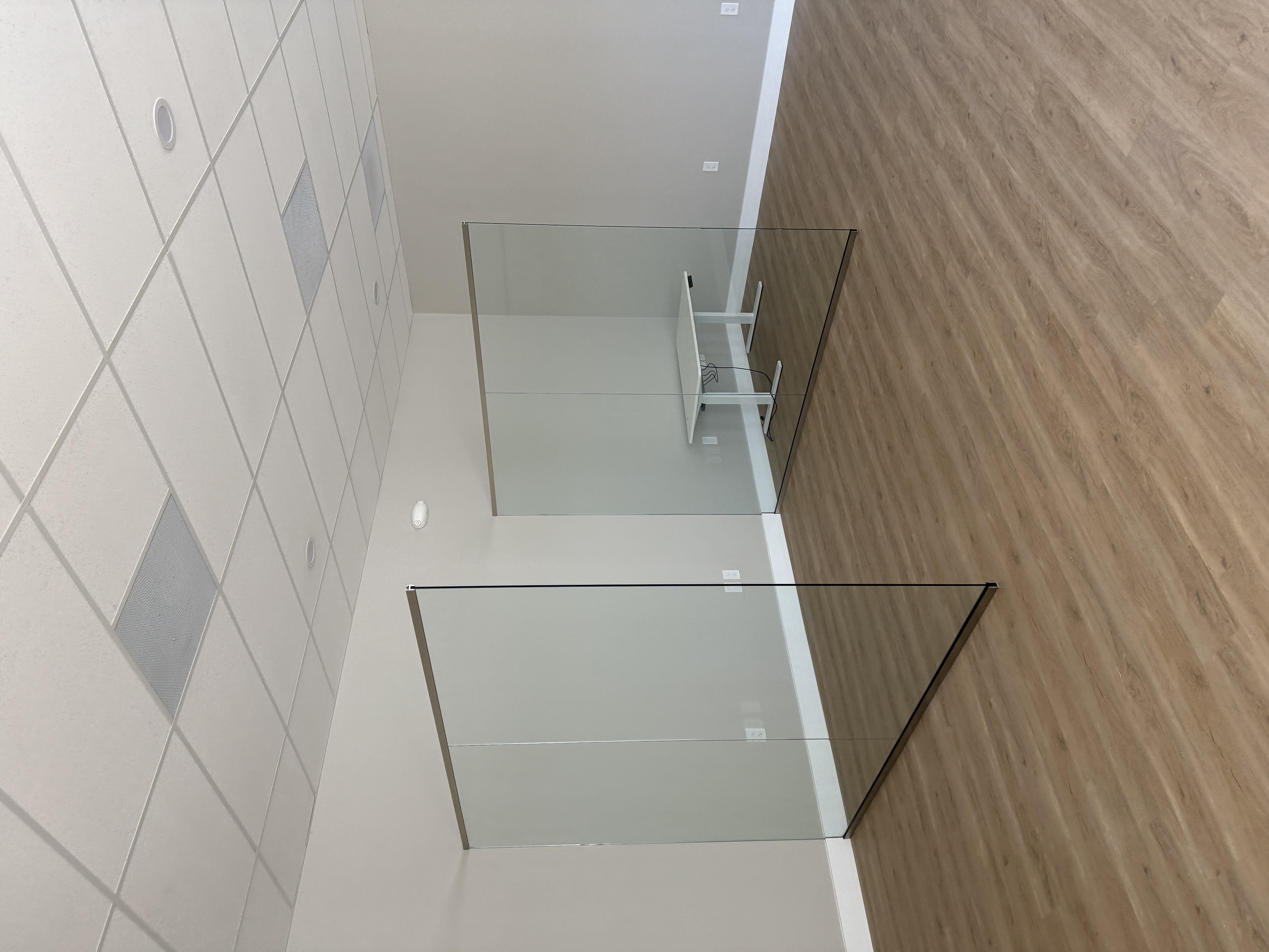 Frameless glass shower enclosure in custom home bathroom