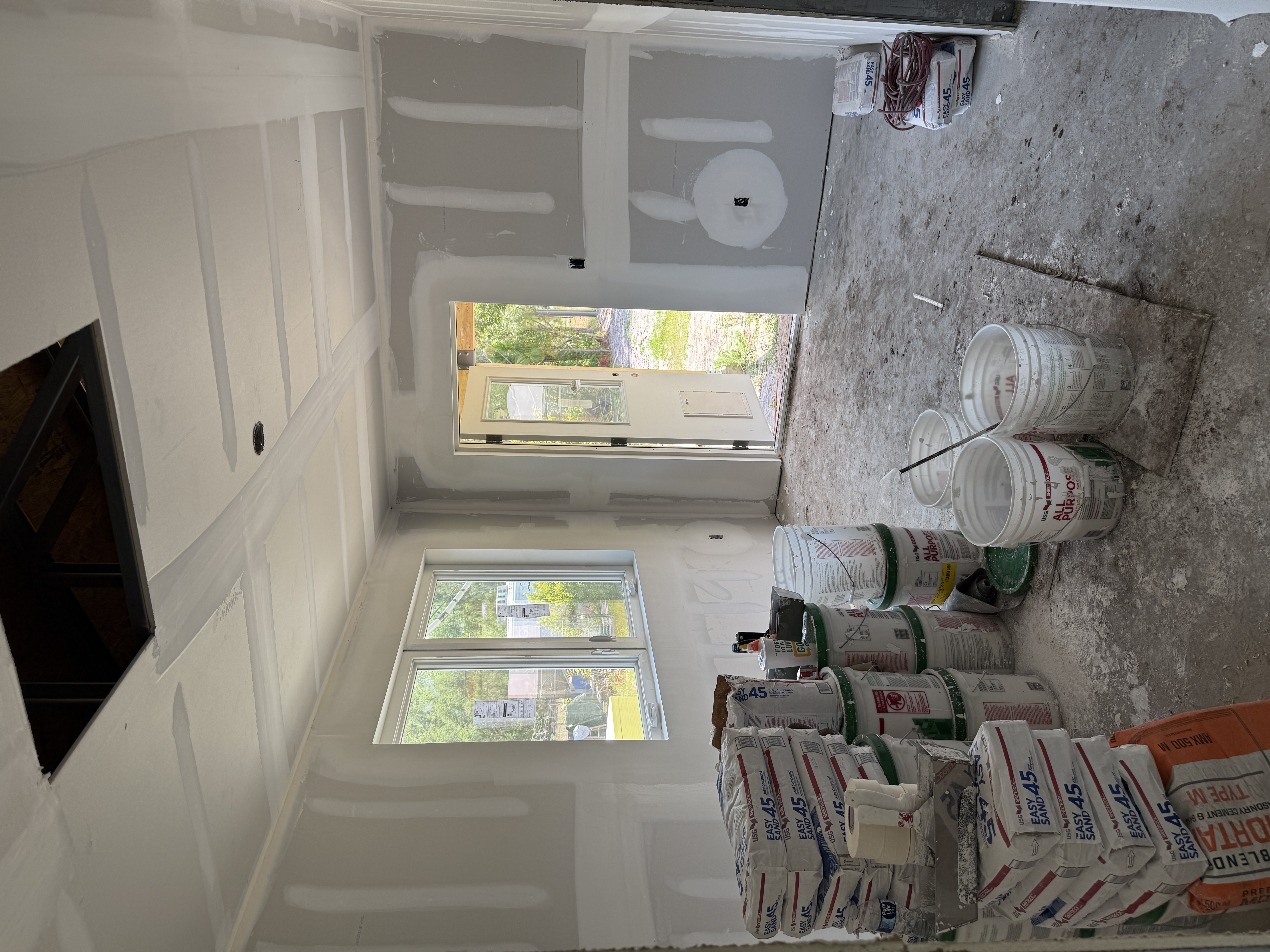 Primer coat applied to interior walls before final paint