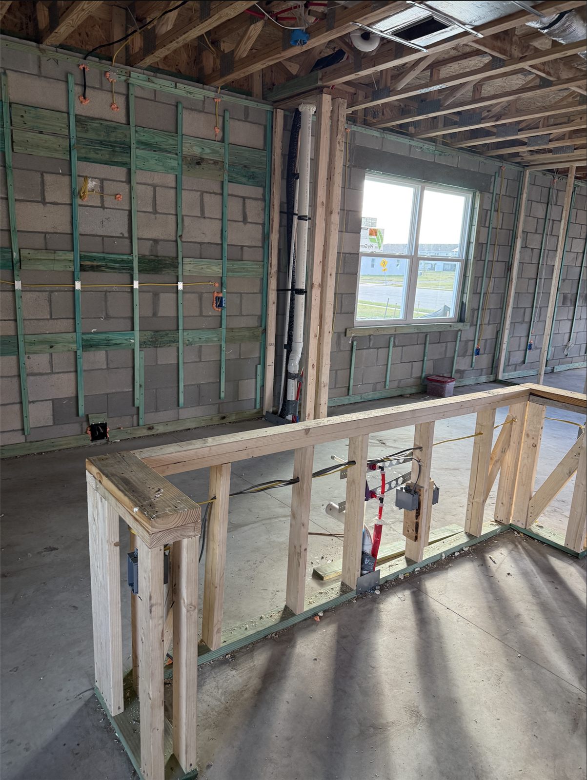 BuilderK custom home exterior under construction in Florida