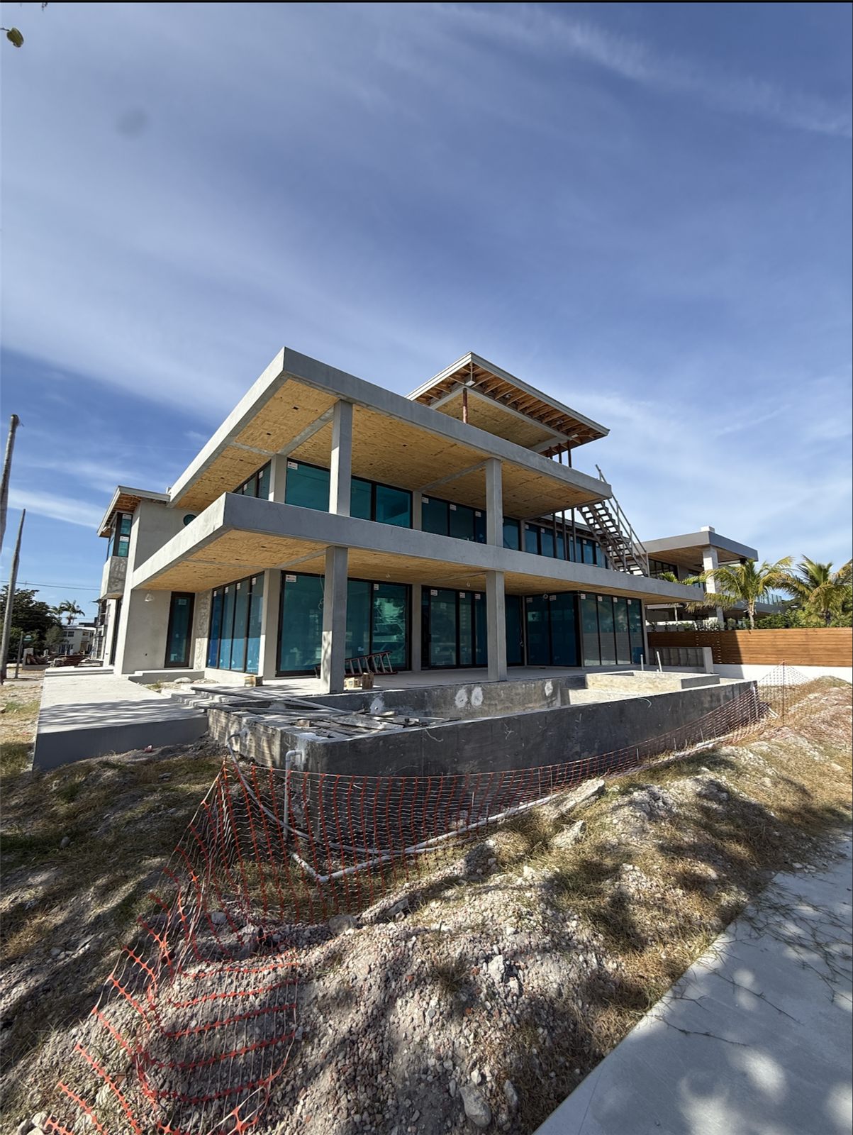 BuilderK custom home exterior under construction in Florida