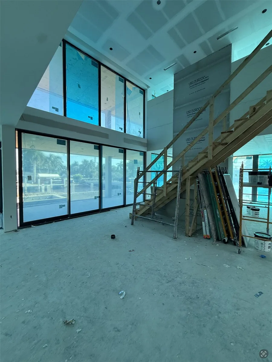 Two story room at the drywall stage in a BuilderK home