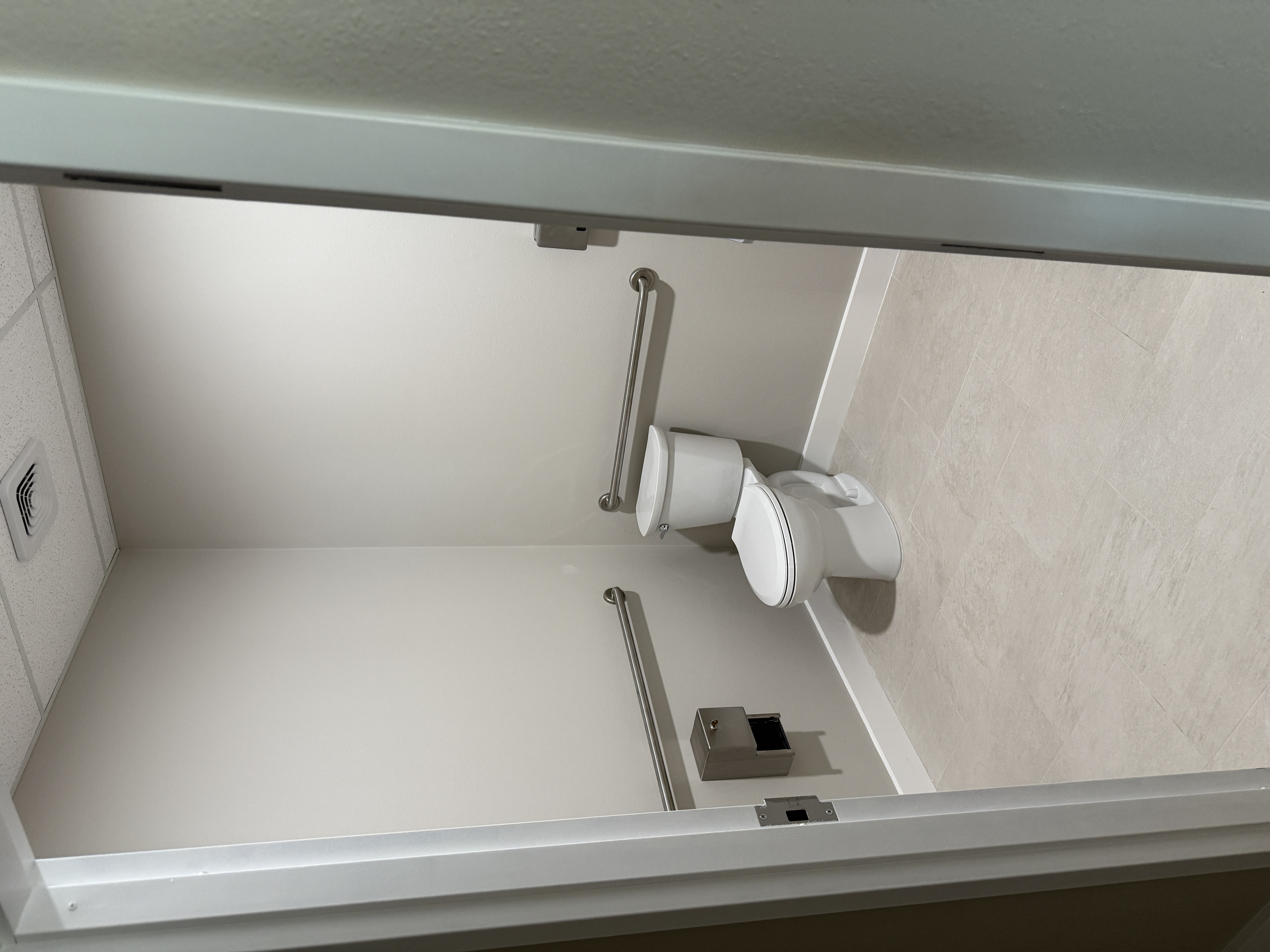 Modern glass staircase in completed custom home