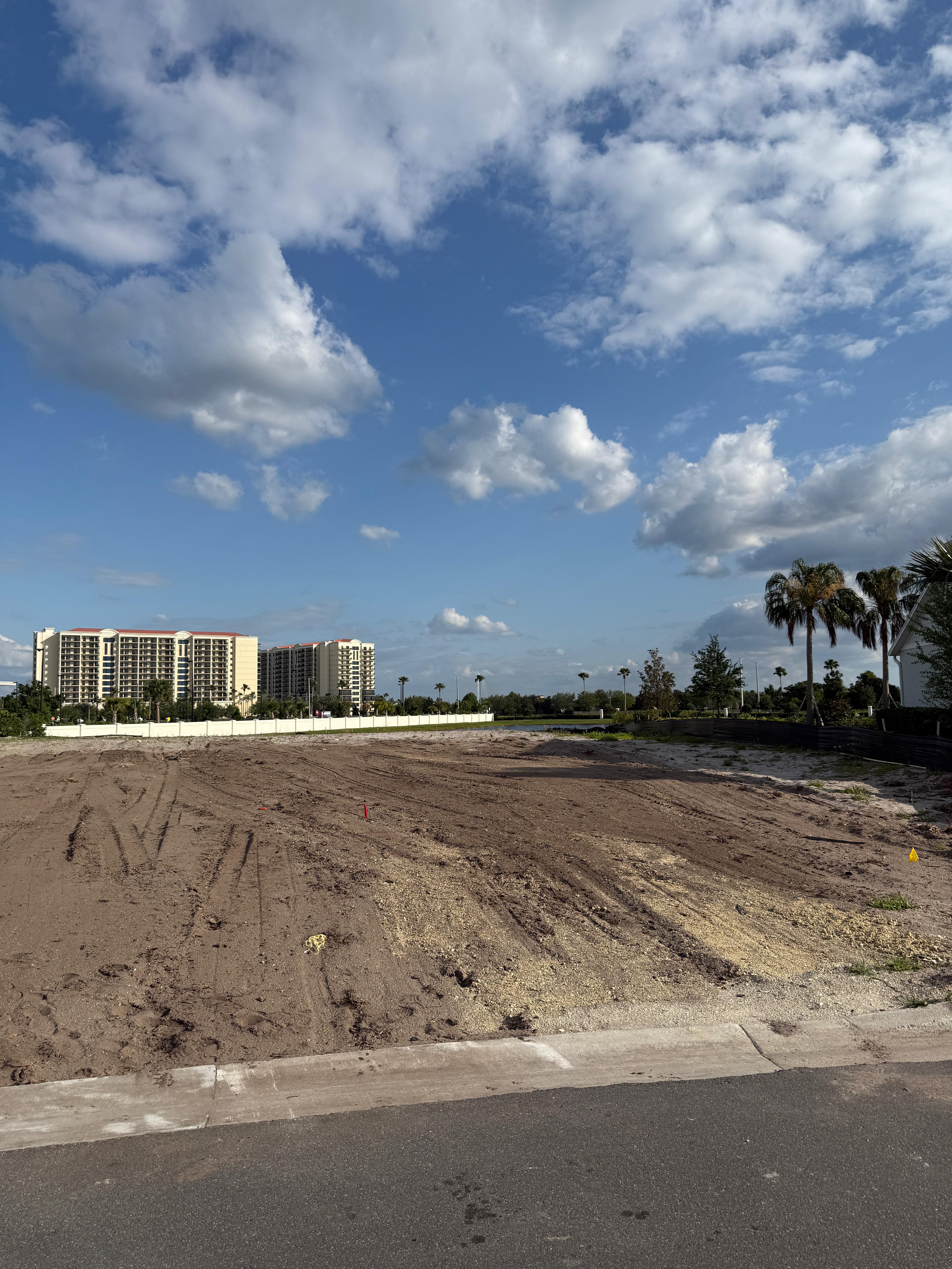 Wide view of interior steel framework in custom home under construction