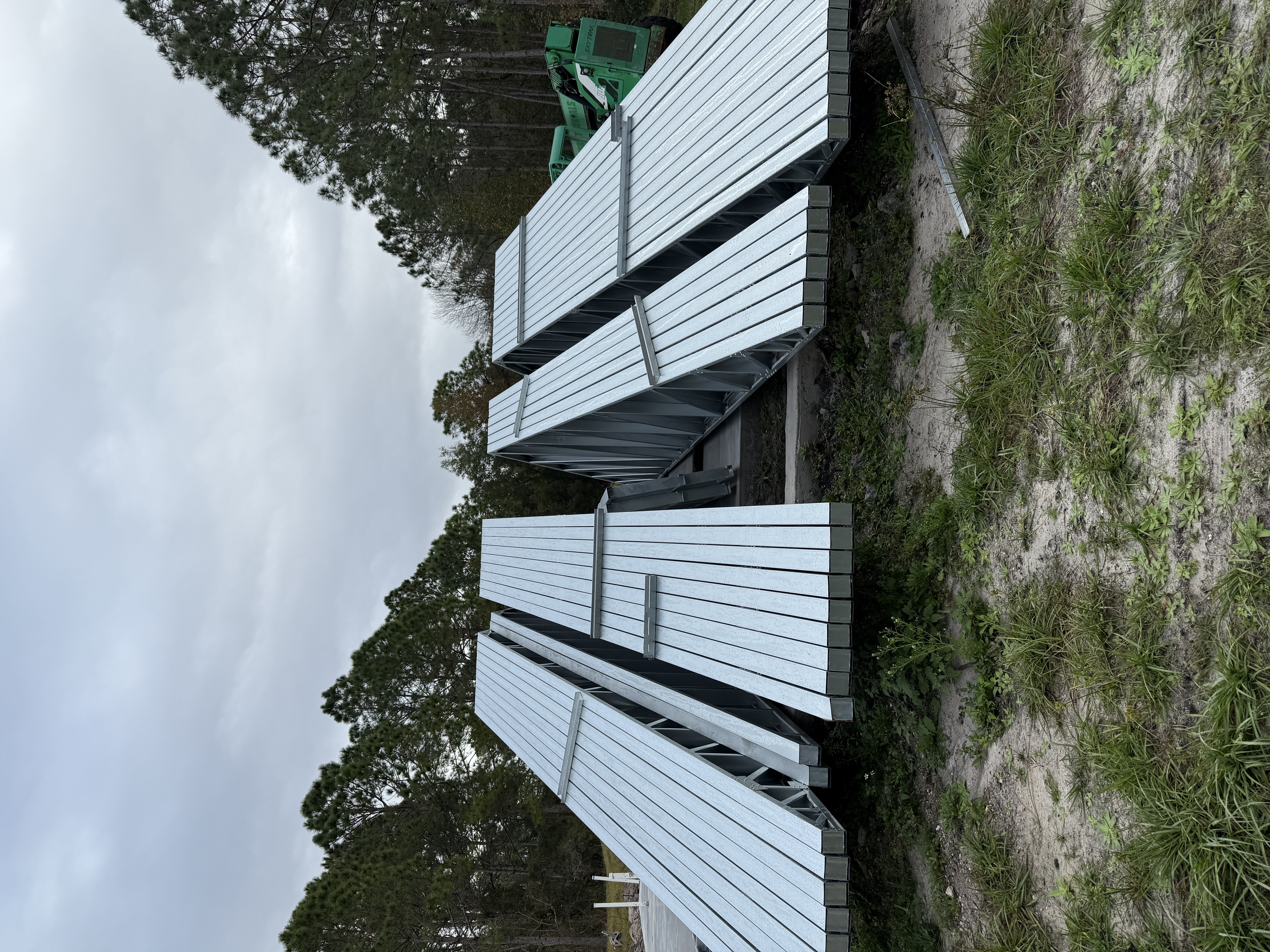 Steel trusses delivered and staged on the job site