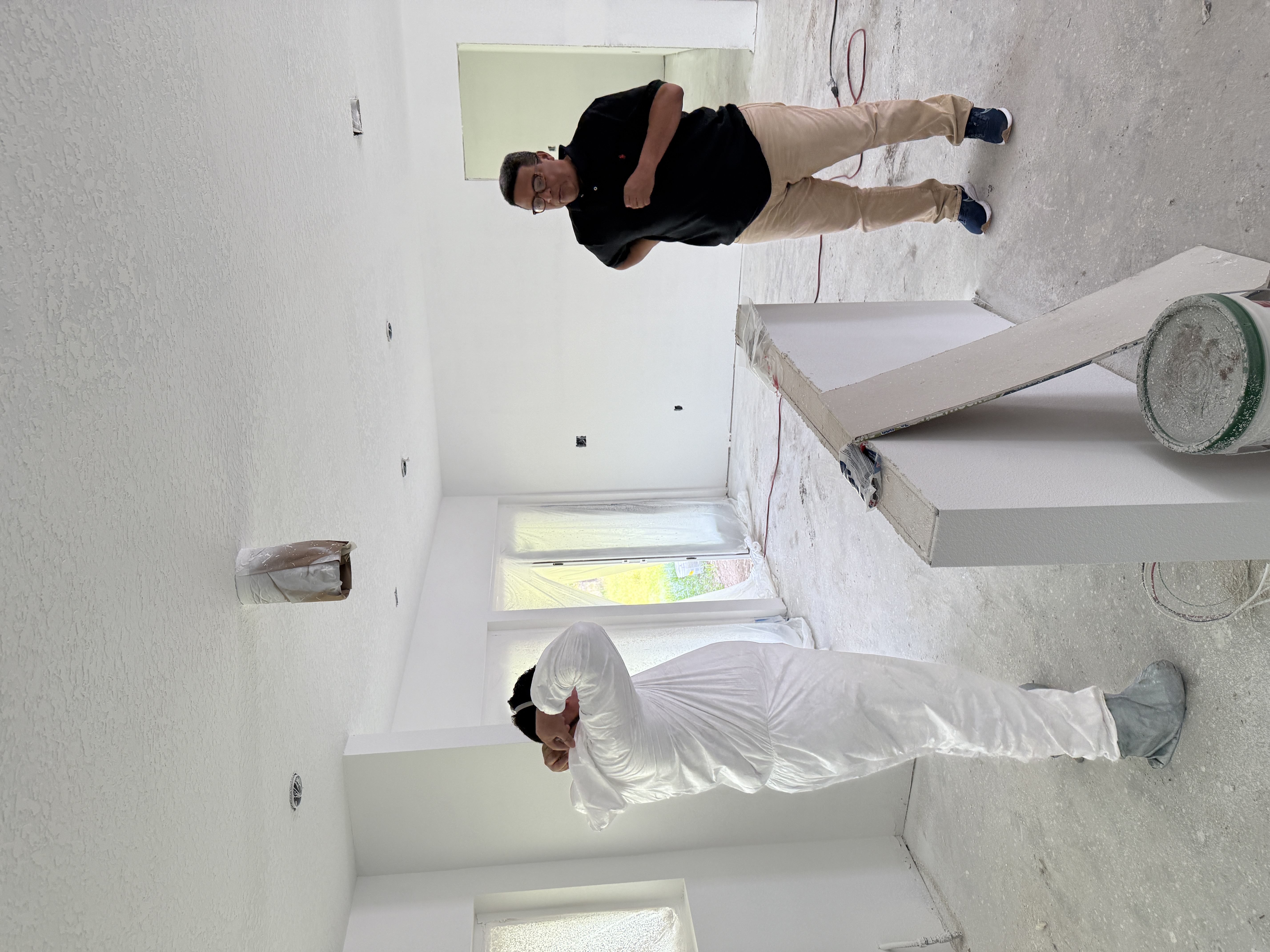 Tile flooring being installed in custom home