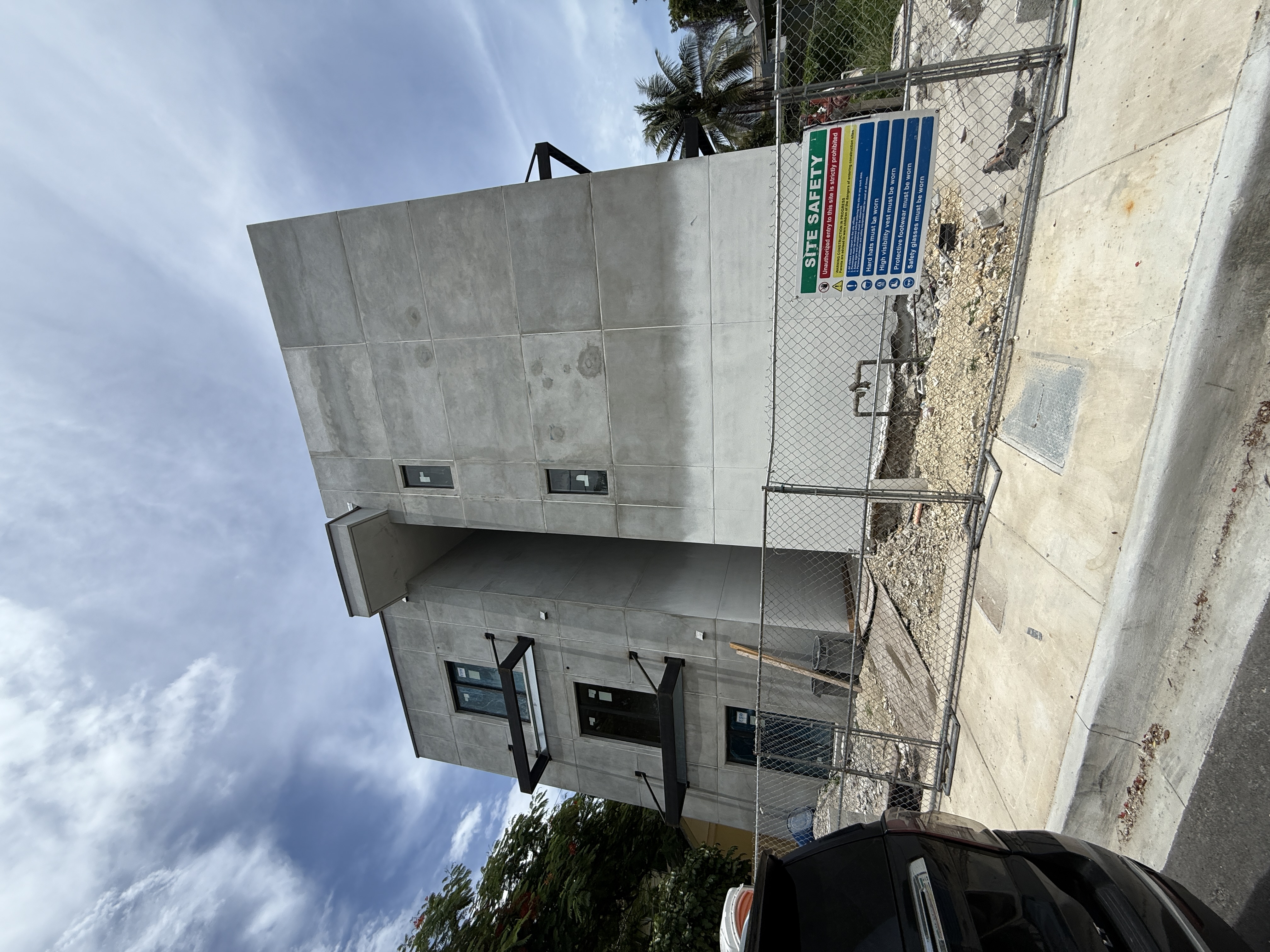 Two-story concrete block home under construction